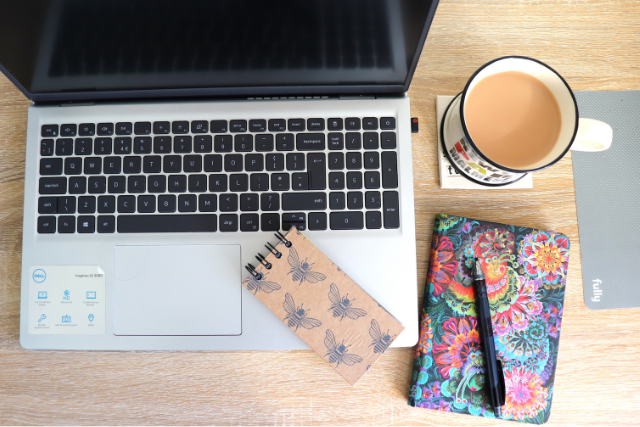 Bee Time Clever laptop with tea and note books