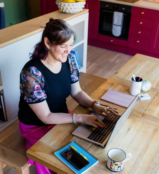 Founder working at her desk.